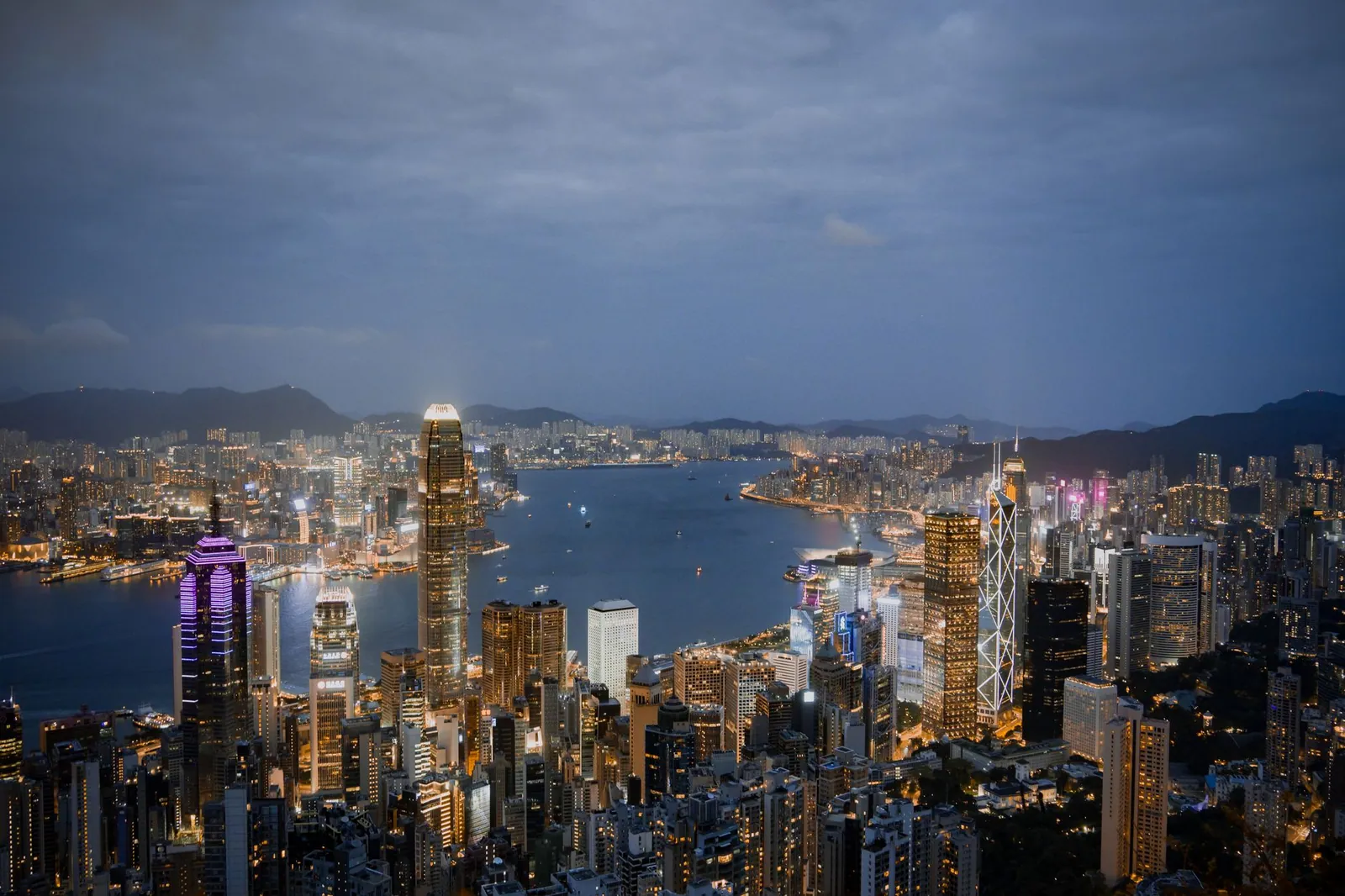 A view of Hong Kong's illuminated skyline and harbour at night