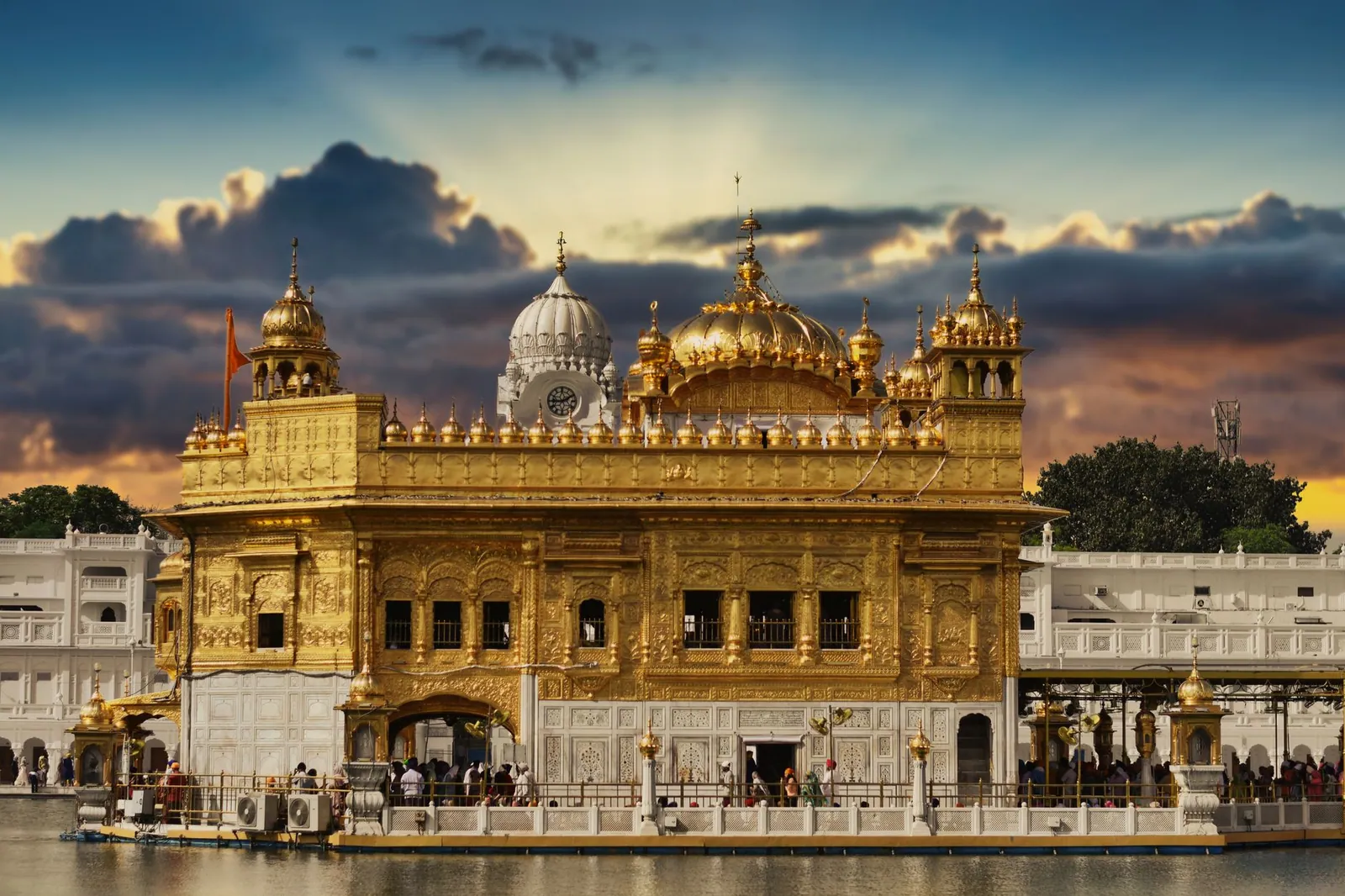 The Golden Temple in Amritsar, India, with a sunset sky