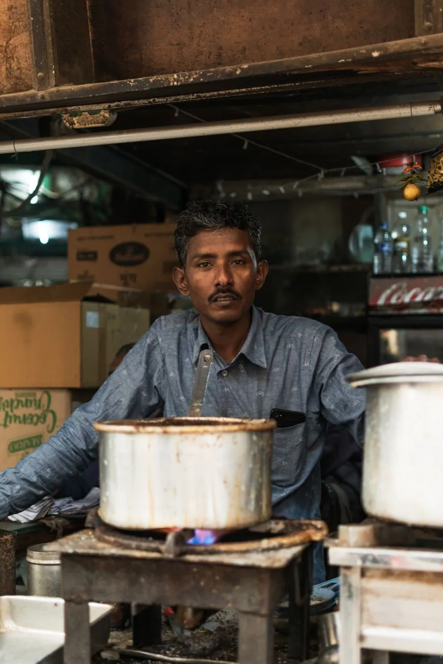 Street food being cooked at a stall in India