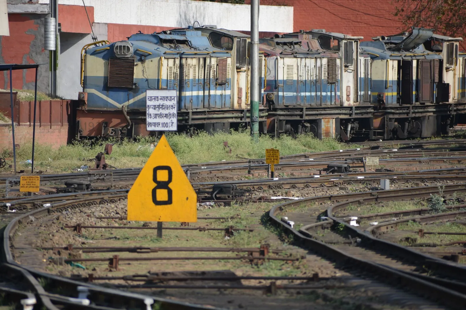 Historic Kalka Shimla railway yard with classic trains on curved tracks, India