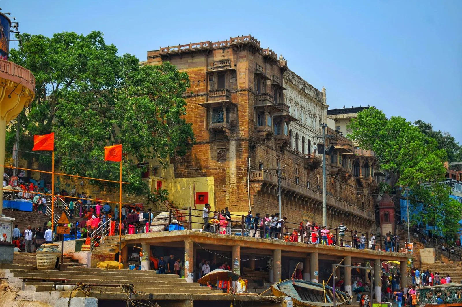 People gather at a historic ghat in Varanasi, Uttar Pradesh, India