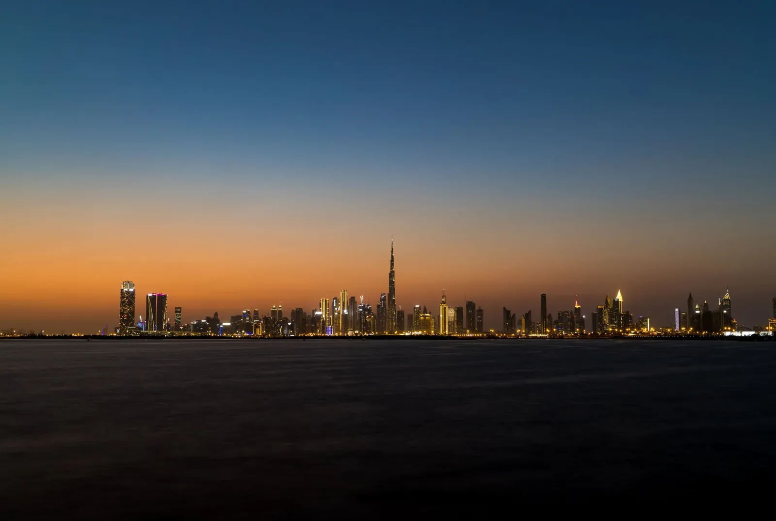 Stunning view of Dubai's skyline at twilight featuring the iconic Burj Khalifa.