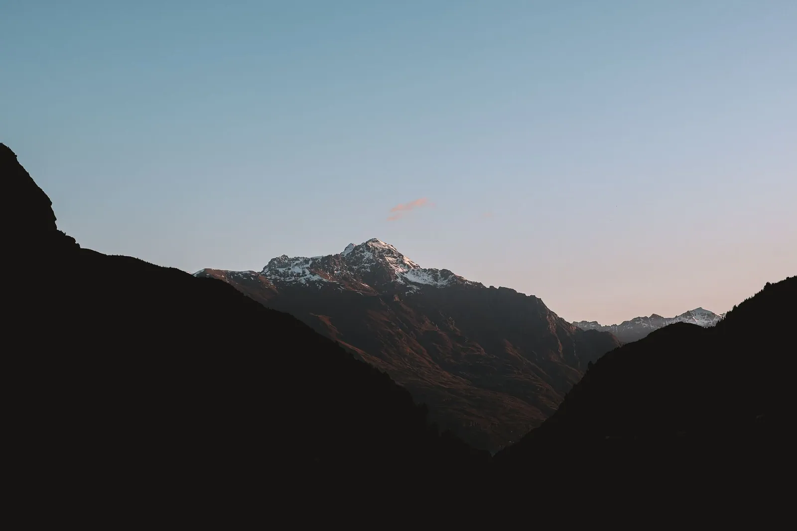Tranquil view of the Southern Alps in New Zealand at dusk