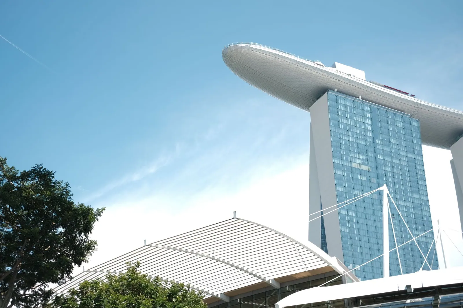 Capture of Marina Bay Sands and ArtScience Museum against a clear blue sky in Singapore