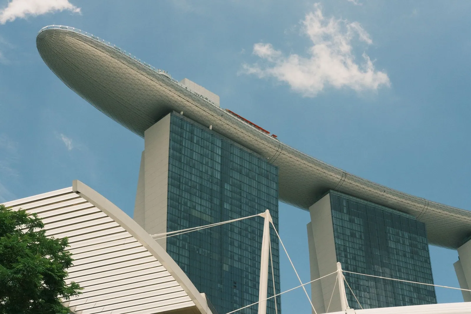 View of the distinctive Marina Bay Sands Hotel in Singapore under a clear blue sky