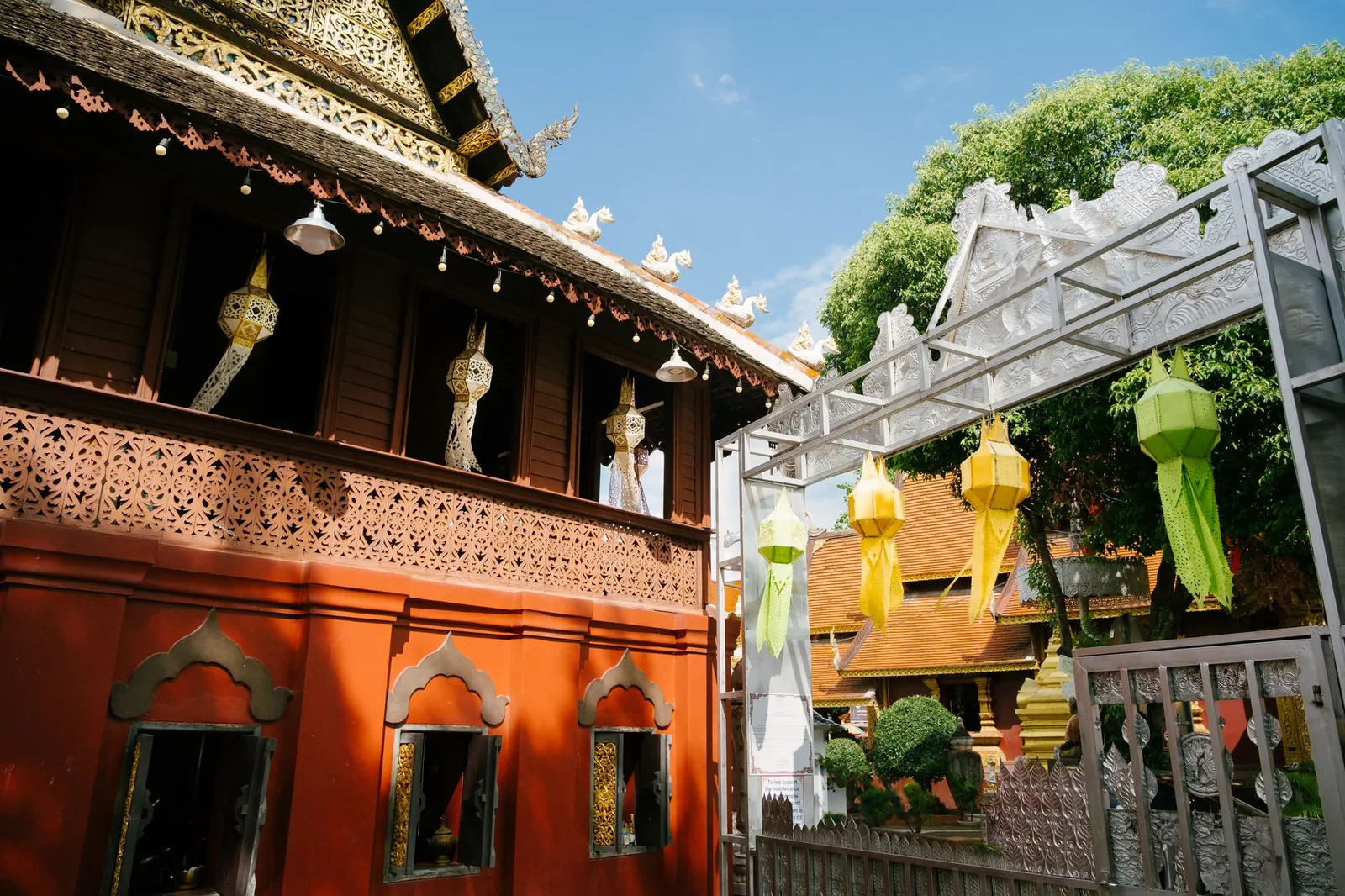 Lanterns and ornate temple architecture in Chiang Mai, Thailand